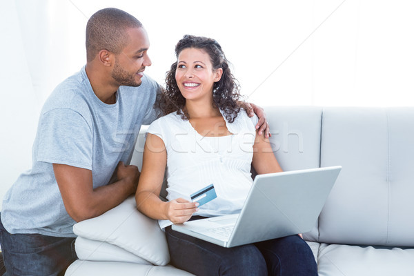 Happy couple shopping online Stock photo © wavebreak_media