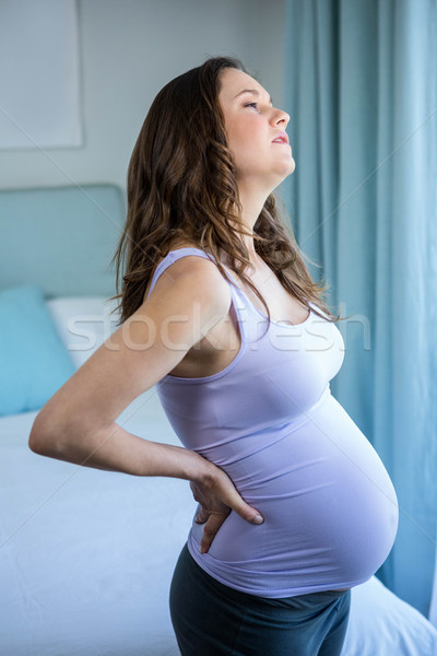 Femme enceinte chambre femme maison santé Photo stock © wavebreak_media