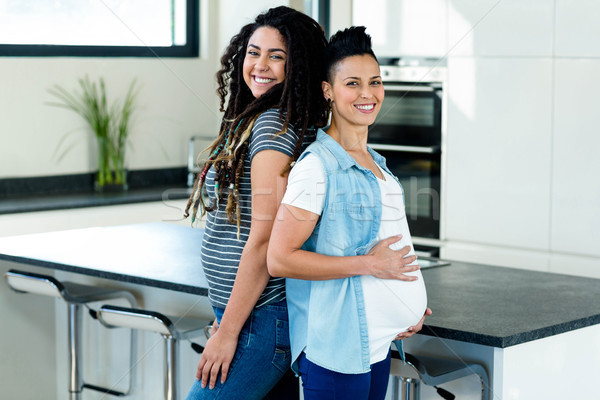 Ciąży lesbijek para stałego powrót uśmiechnięty Zdjęcia stock © wavebreak_media