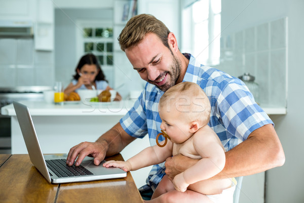 Vater schauen Baby Junge mit Laptop home Stock foto © wavebreak_media