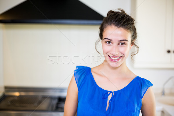 Portrait of young woman smiling Stock photo © wavebreak_media