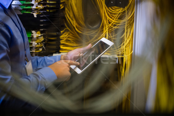 Technician using digital tablet Stock photo © wavebreak_media