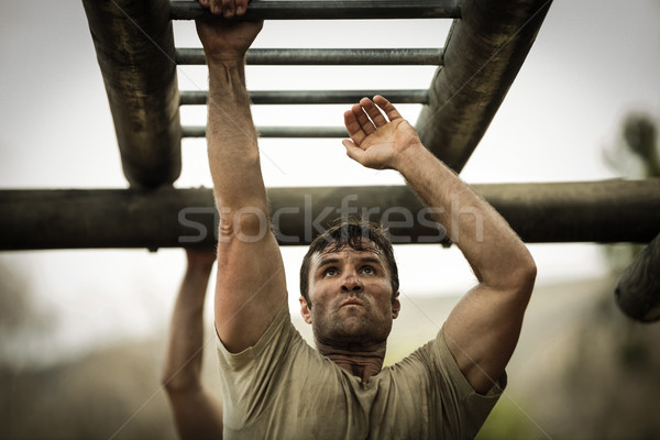 Soldier climbing monkey bars Stock photo © wavebreak_media