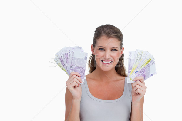 [[stock_photo]]: Femme · banque · note · blanche · jeunes