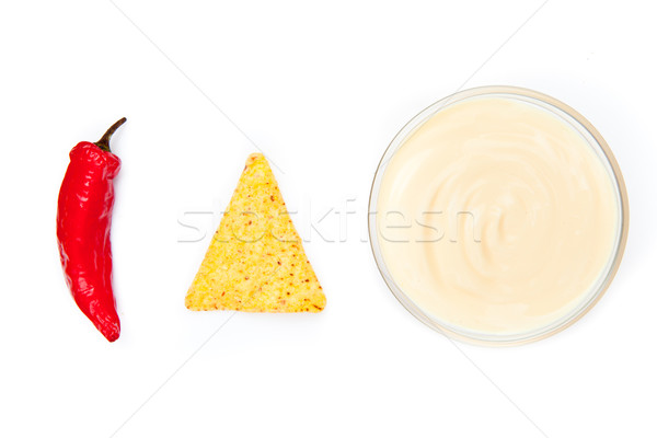 Bowl of dip nacho and pepper side by side against a white background Stock photo © wavebreak_media