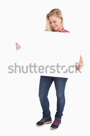 Mosolyog szőke nő mutat üres tábla fehér boldog Stock fotó © wavebreak_media