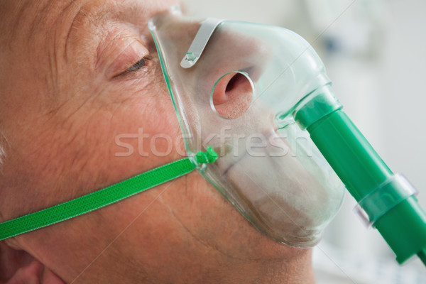 Man wearing oxegen mask in hospital Stock photo © wavebreak_media