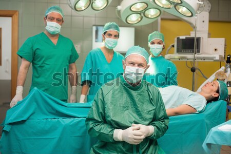 Groep chirurgen werken vrouwelijke patiënt man Stockfoto © wavebreak_media