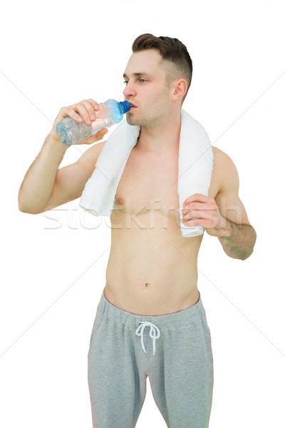 Sem camisa homem água potável toalha em torno de pescoço Foto stock © wavebreak_media