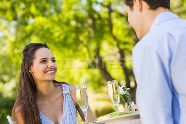 Paar champagne fluiten vergadering outdoor glimlachend Stockfoto © wavebreak_media