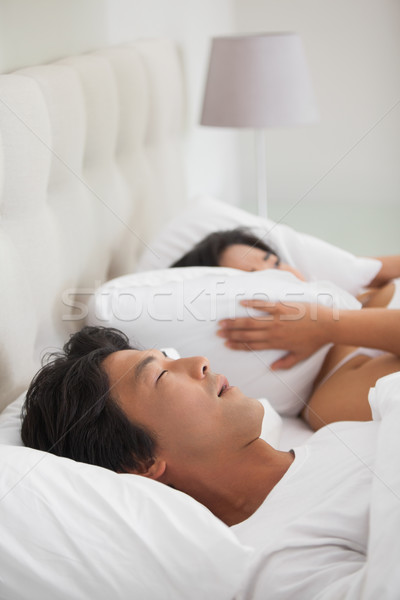 Vrouw oren partner snurken home slaapkamer Stockfoto © wavebreak_media