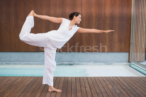 Content brunette in white in the shiva posture Stock photo © wavebreak_media