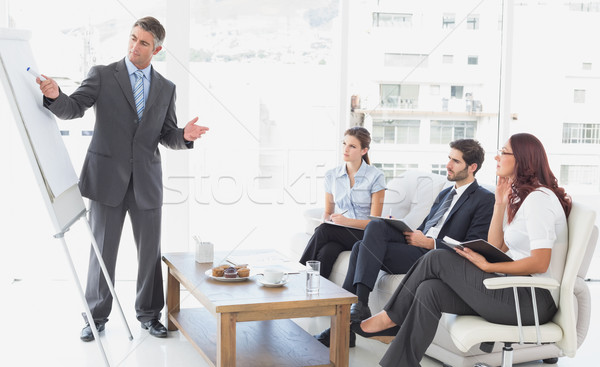 Businessman giving a presentation Stock photo © wavebreak_media