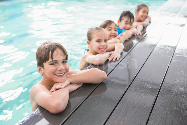 Cute swimming class in the pool Stock photo © wavebreak_media