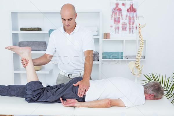 Stockfoto: Been · massage · patiënt · medische · kantoor · man