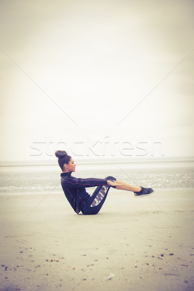 Fit girl working out on cold day Stock photo © wavebreak_media