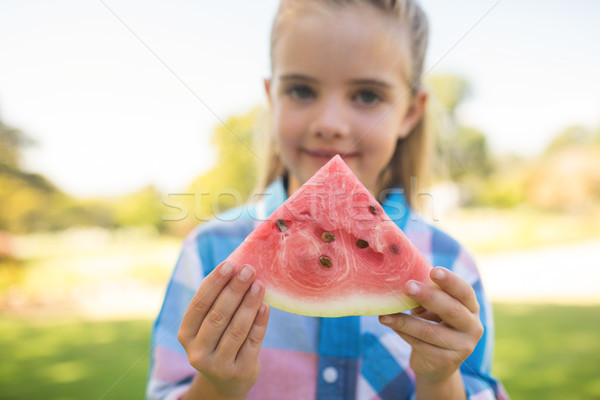 Mädchen halten Wassermelone Scheibe Park Porträt Stock foto © wavebreak_media