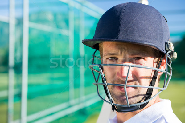 Portrait of cricket player wearing helmet Stock photo © wavebreak_media