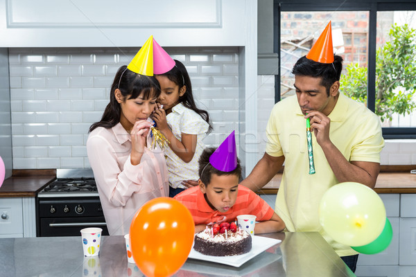 Happy family celebrating a birthday Stock photo © wavebreak_media