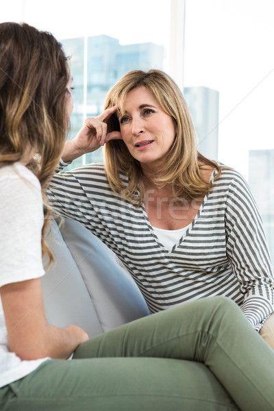 Mother talking to daughter Stock photo © wavebreak_media