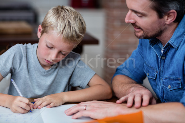 Vater helfen Sohn Hausaufgaben Küche home Stock foto © wavebreak_media