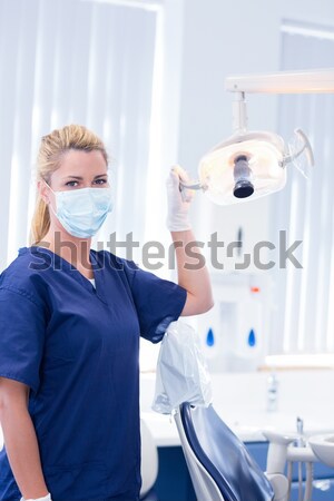 Female patient receiving dental treatment Stock photo © wavebreak_media