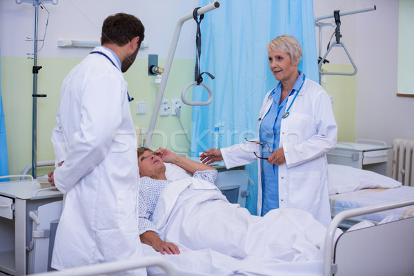 Doctors talking to a senior patient Stock photo © wavebreak_media