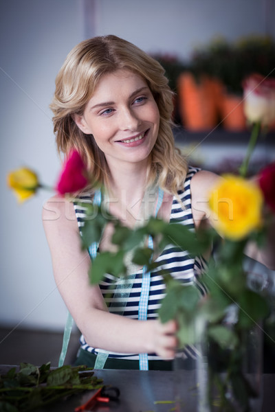 Female florist arranging flower Stock photo © wavebreak_media