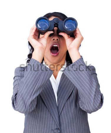 Uimit femeie de afaceri uita binoclu izolat alb Imagine de stoc © wavebreak_media