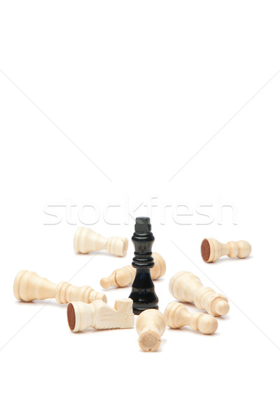 Dark king and white pieces of chess on a white background Stock photo © wavebreak_media