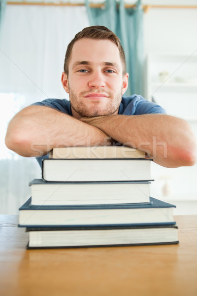 Férfi diák dől könyvek mosoly arc Stock fotó © wavebreak_media
