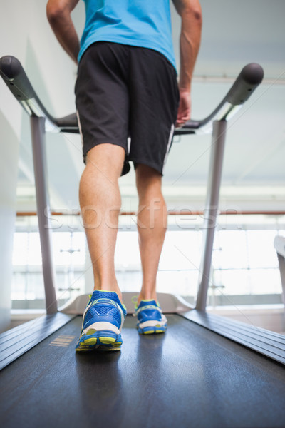 Low section of a man running on treadmill Stock photo © wavebreak_media