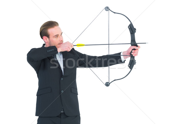 Businessman shooting a bow and arrow Stock photo © wavebreak_media
