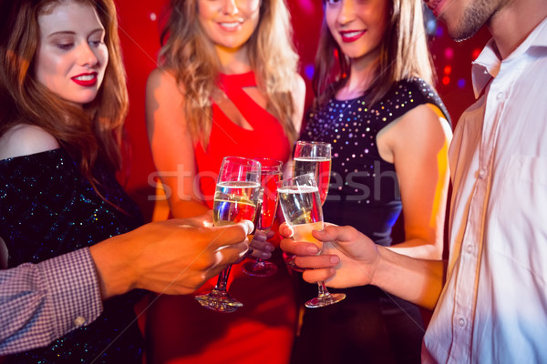 Happy friends on a night out together Stock photo © wavebreak_media