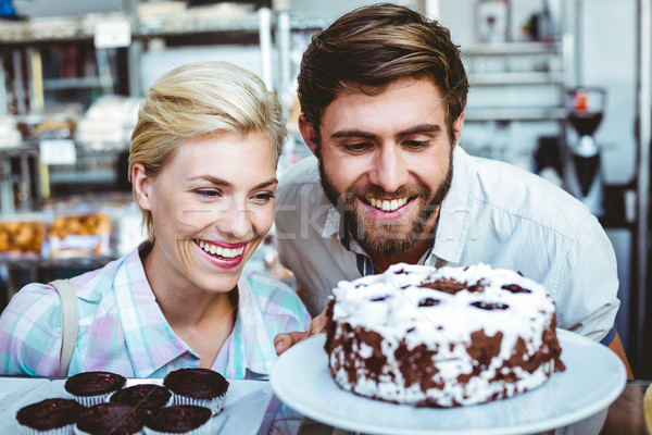 Cute couple on a date looking at a chocolate cake Stock photo © wavebreak_media