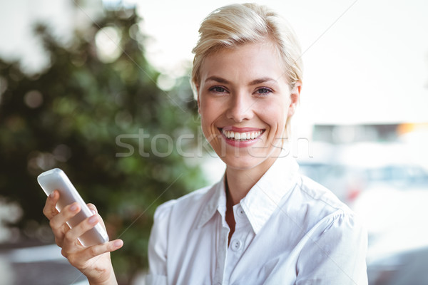 Jeune femme téléphone café communication Homme souriant [[stock_photo]] © wavebreak_media