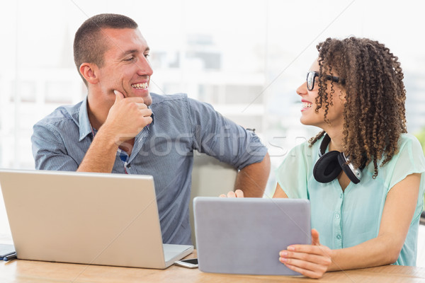 Smiling business colleagues discussing together Stock photo © wavebreak_media