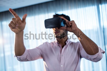 Man wearing VR Virtual Reality Headset with Interface Stock photo © wavebreak_media