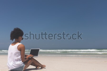 Stockfoto: Jonge · vrouw · mediteren · zand · strand · hemel