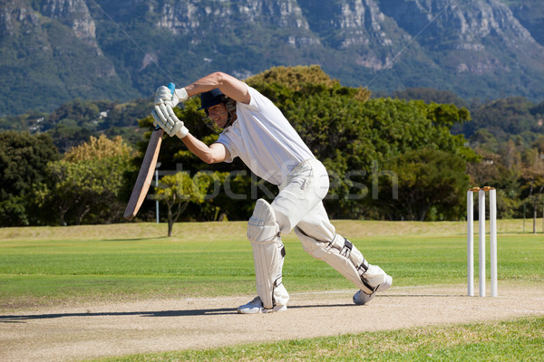 Full length of cricketer playing on field Stock photo © wavebreak_media