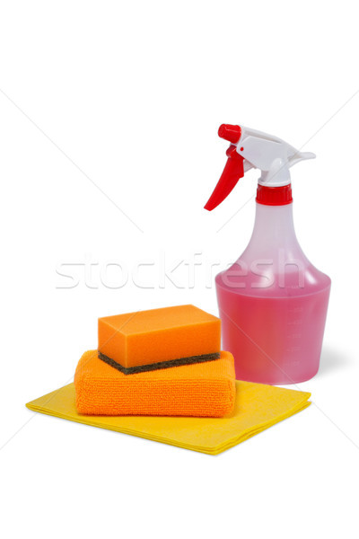 Detergent spray bottle, scouring pad and cleaning pad on white background Stock photo © wavebreak_media