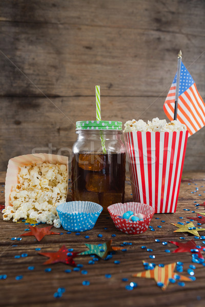 Popcorn, sweet food and cold drink decorated with 4th july theme Stock photo © wavebreak_media