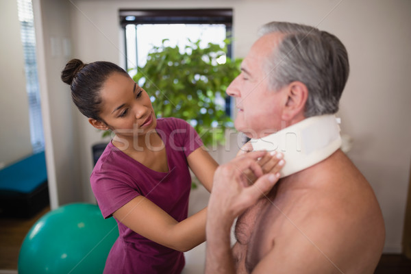 Foto stock: Femenino · terapeuta · examinar · cuello · altos · masculina