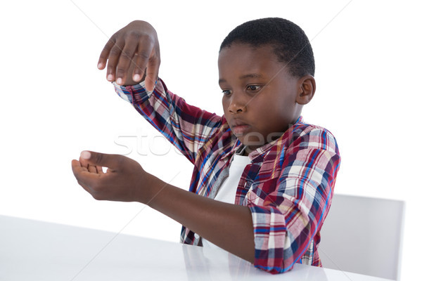 Boy pretending to work on an invisible object Stock photo © wavebreak_media