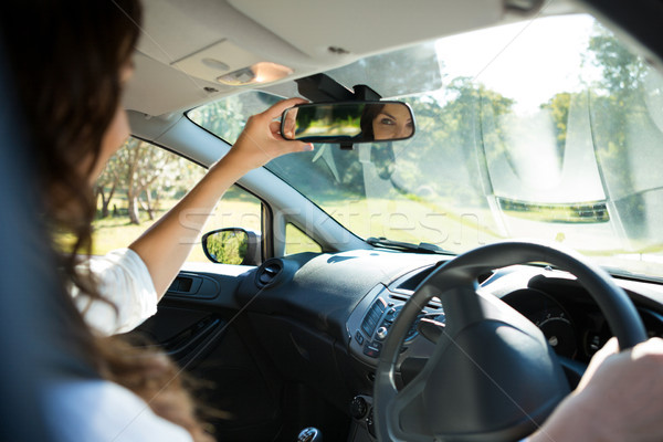 [[stock_photo]]: Femme · regarder · vue · arrière · miroir · conduite · voiture