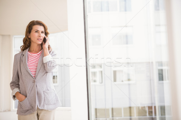 Casual businesswoman having a phone call Stock photo © wavebreak_media