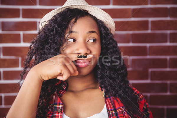 [[stock_photo]]: Moustache · doigt · rouge · brique · heureux