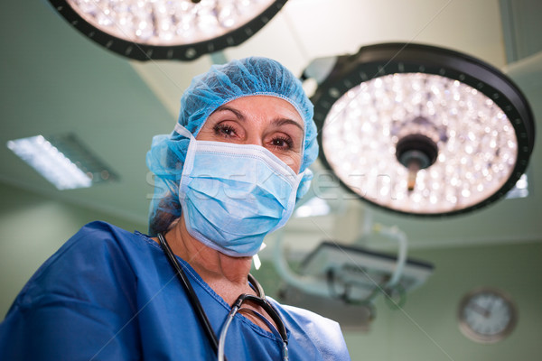 Retrato cirurgião em pé operação quarto hospital Foto stock © wavebreak_media