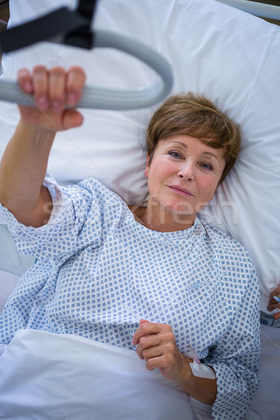 Portré mosolyog beteg ágy kórház nő Stock fotó © wavebreak_media