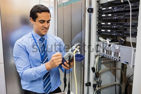 Technician using digital cable analyzer Stock photo © wavebreak_media